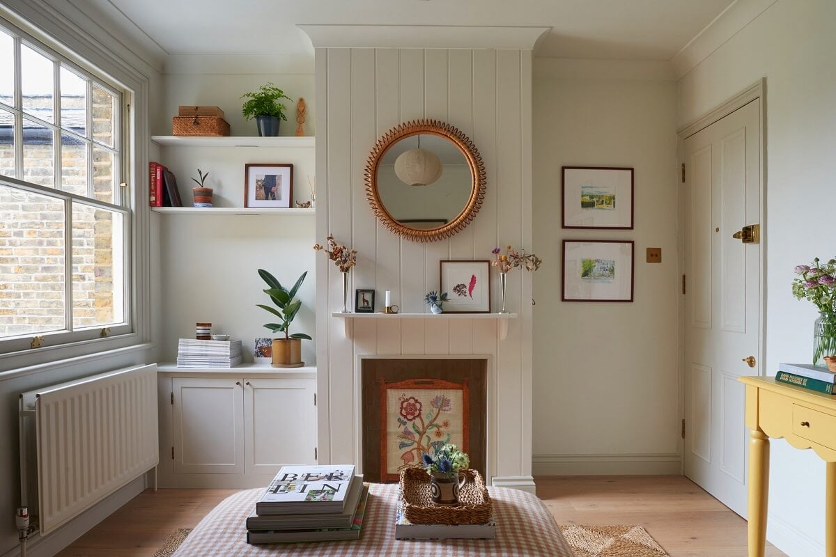A Small Cottage-Style Apartment in London 6 small living room with boarded walls and fireplace