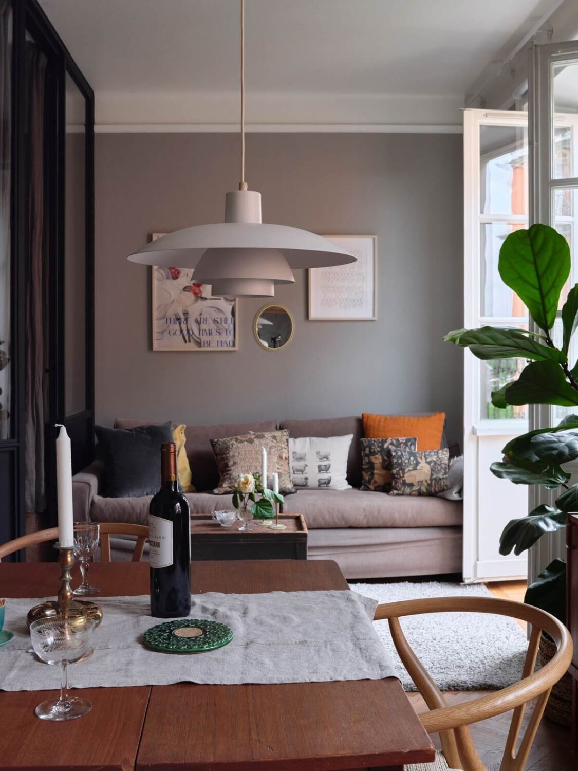 A Small Gray Apartment with Industrial Glass Walls 2 small living room with gray walls