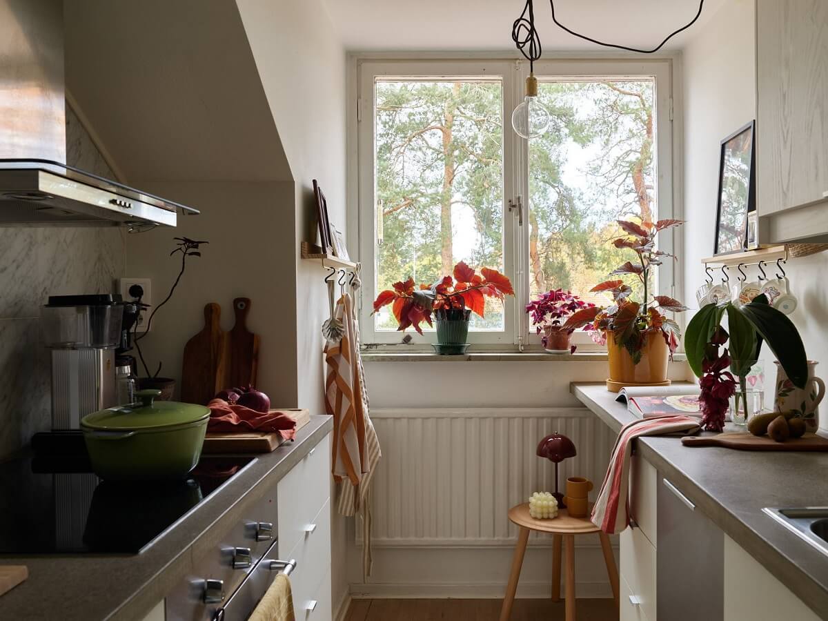 A Small Attic Apartment with a Golden Yellow Bedroom 10 small white kitchen