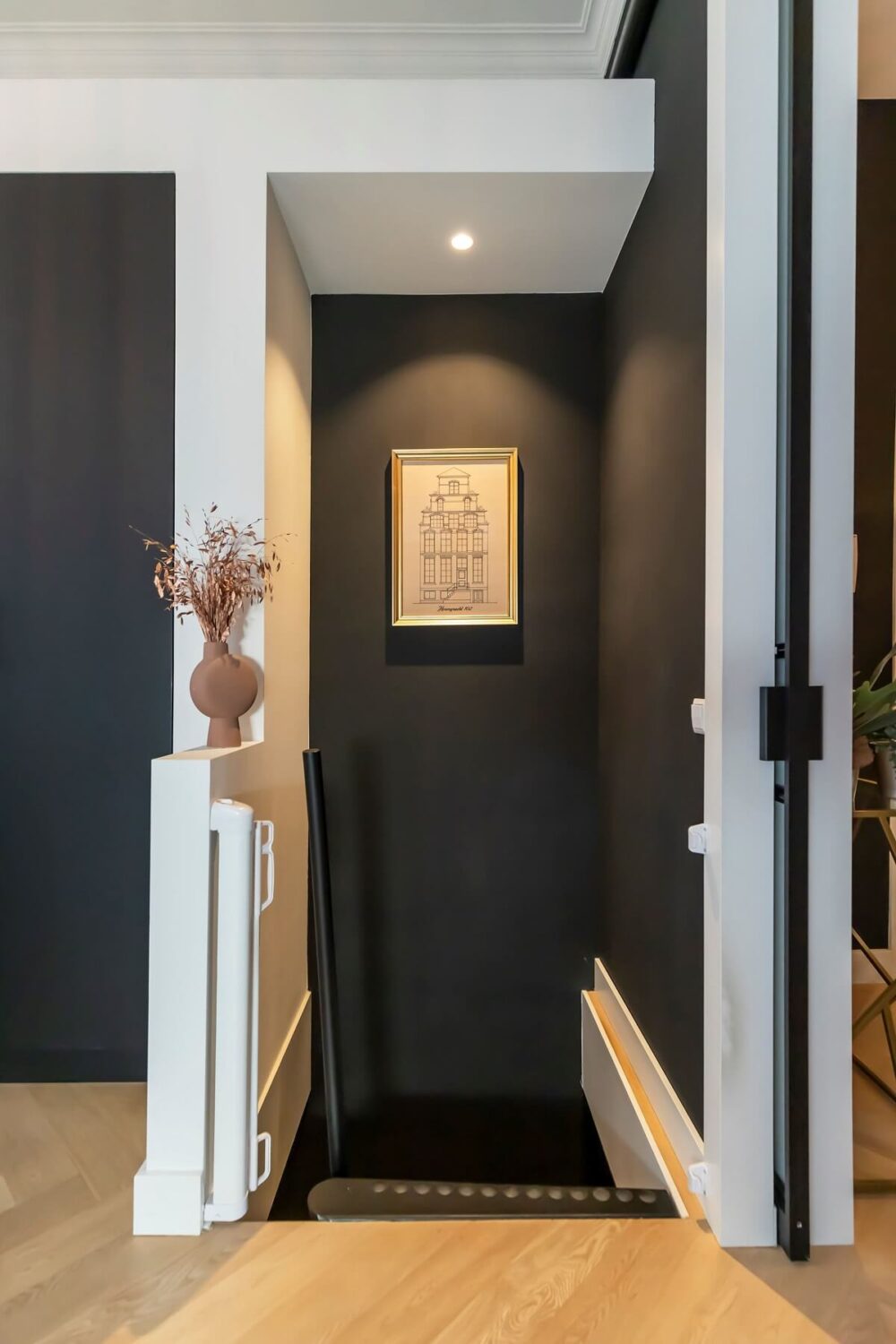 A Renovated Canal House with a Separate Pink Studio Apartment 10 staircase with black walls