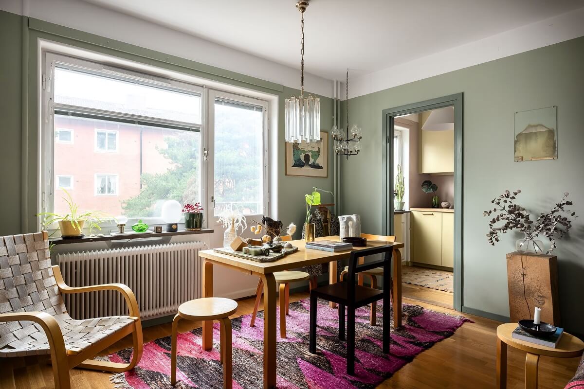 A Cozy Studio Apartment with a Yellow Kitchen 9 studio apartment with purple rug