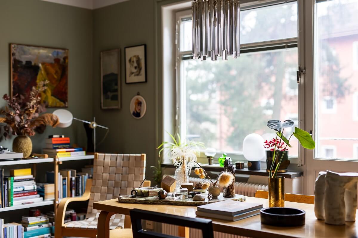 A Cozy Studio Apartment with a Yellow Kitchen 5 studio table detail