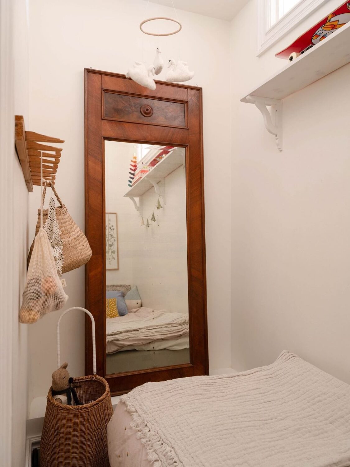 Elsa Billgren's Serene Stockholm Apartment is For Sale 21 tiny bedroom with wooden mirror