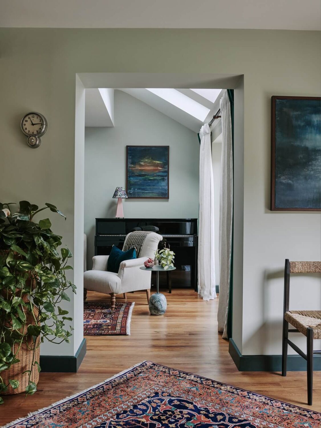 Persian and British Influences in a Cotswolds Family Home 4 view-into-sitting-room-persian-rug-nordroom