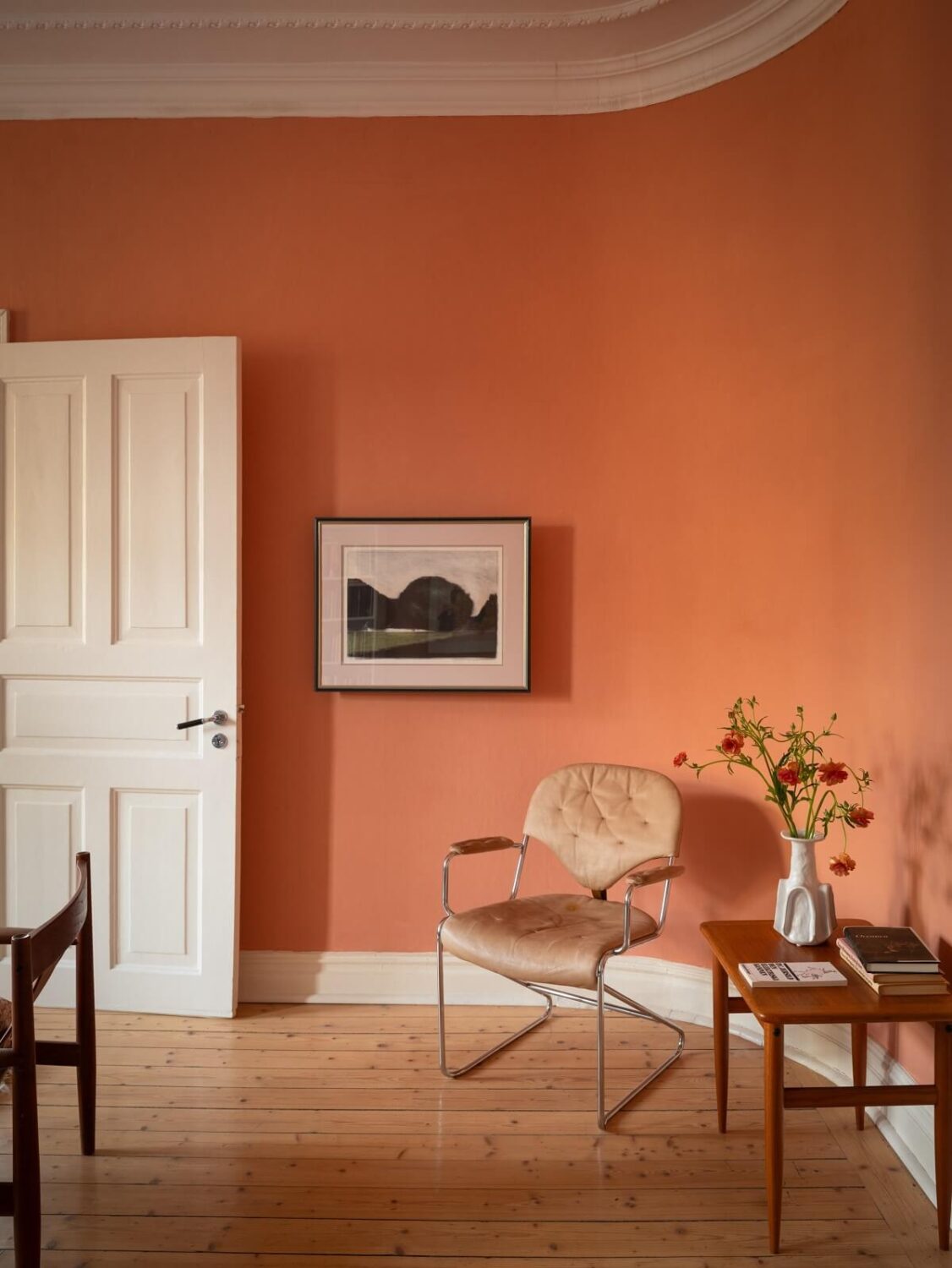 A Scandinavian Apartment with a Warm Living Room and Rounded Walls 8 warm paint color and rounded wall