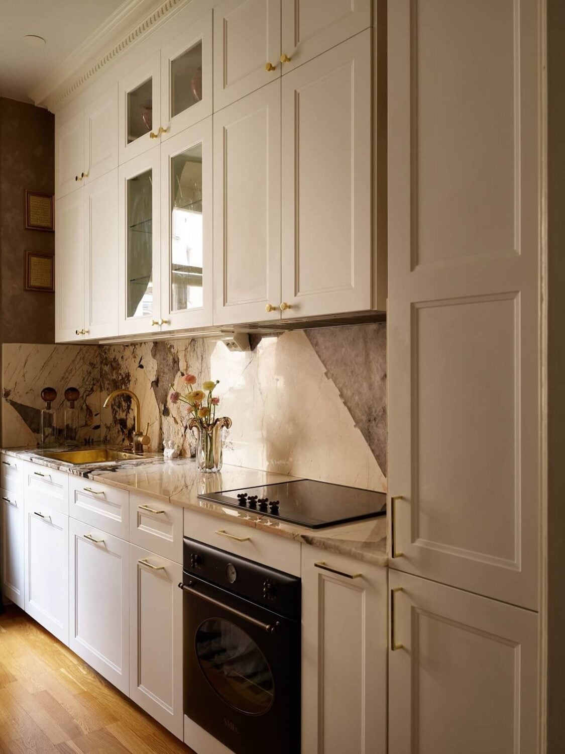 A Classic & Cozy Apartment Painted in Pastel Pink and Blue 15 white-kitchen-marble-worktop-backsplash-nordroom