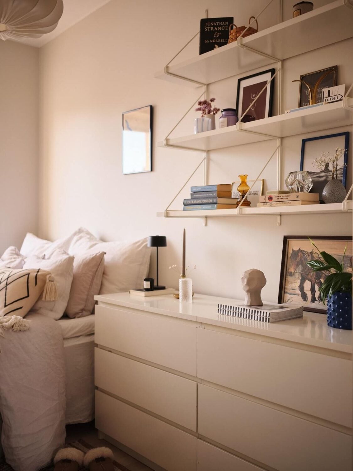 A Small Midcentury Apartment in Stockholm 10 white malm dressers with shelves
