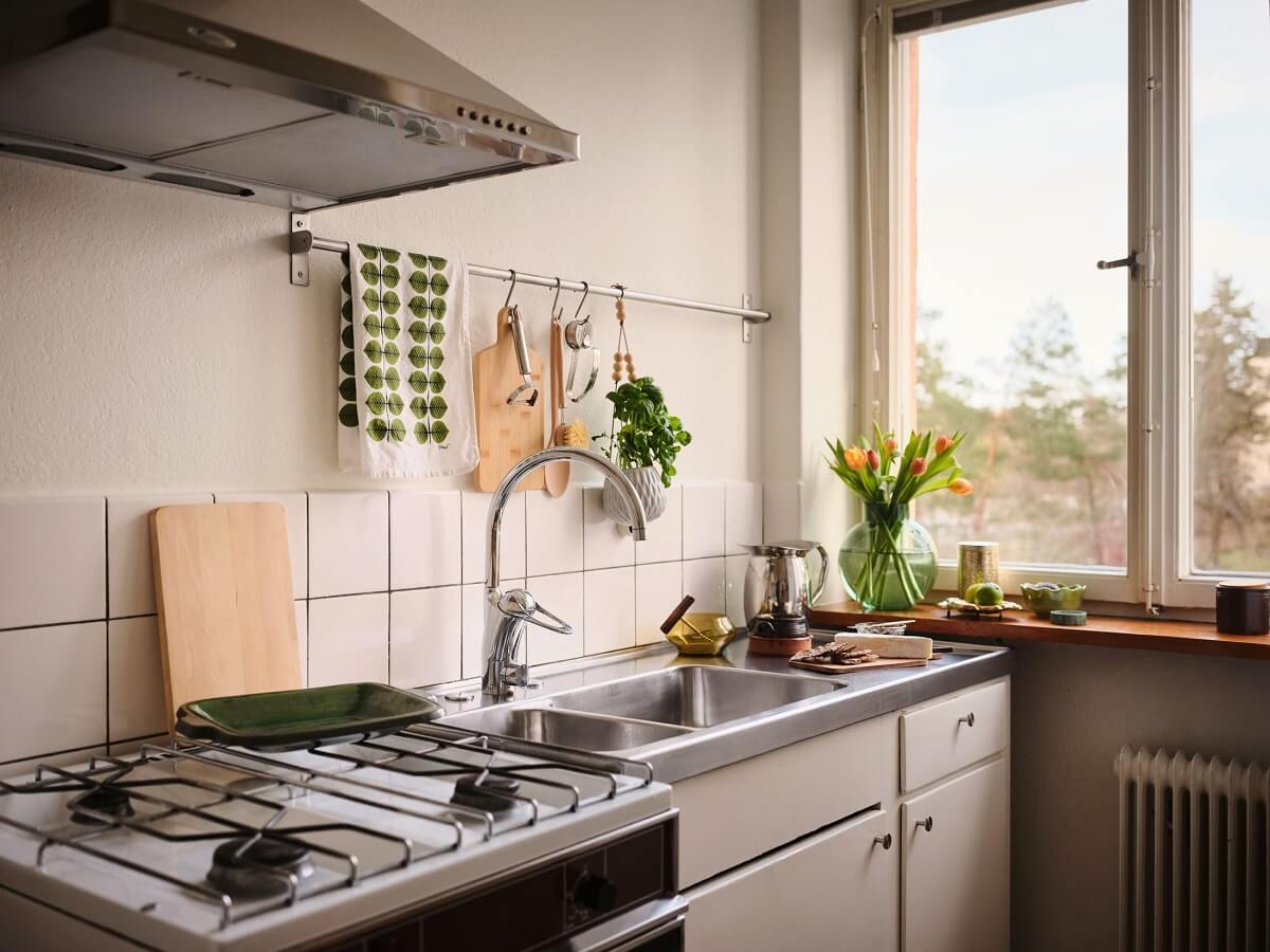 A Small Midcentury Apartment in Stockholm 8 white midcentury kitchen