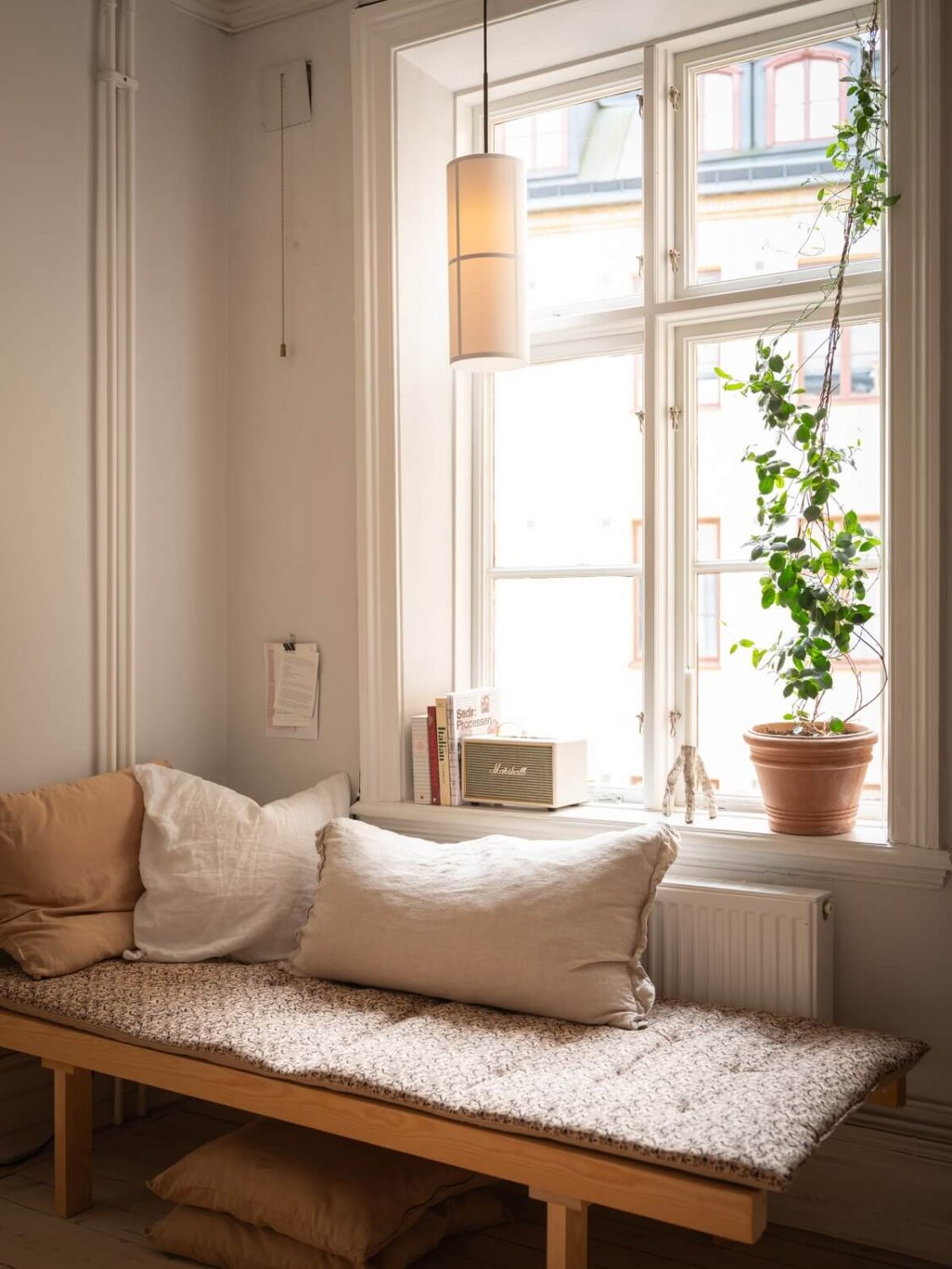 Light Rooms and Soft Color Tones in a Swedish Apartment 14 window seat bench