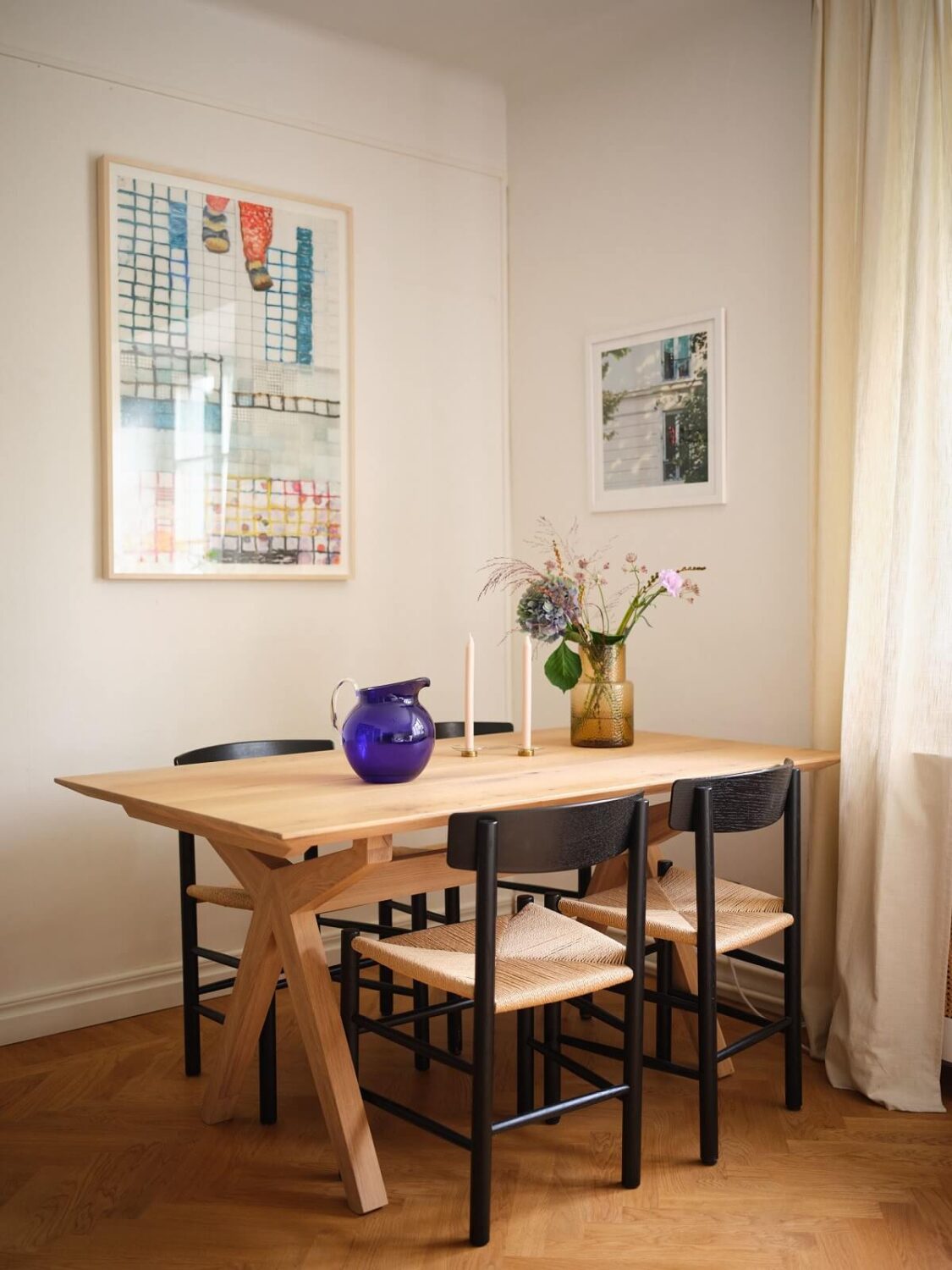 A Light Corner Apartment with a Pink Bedroom 7 wooden dining table