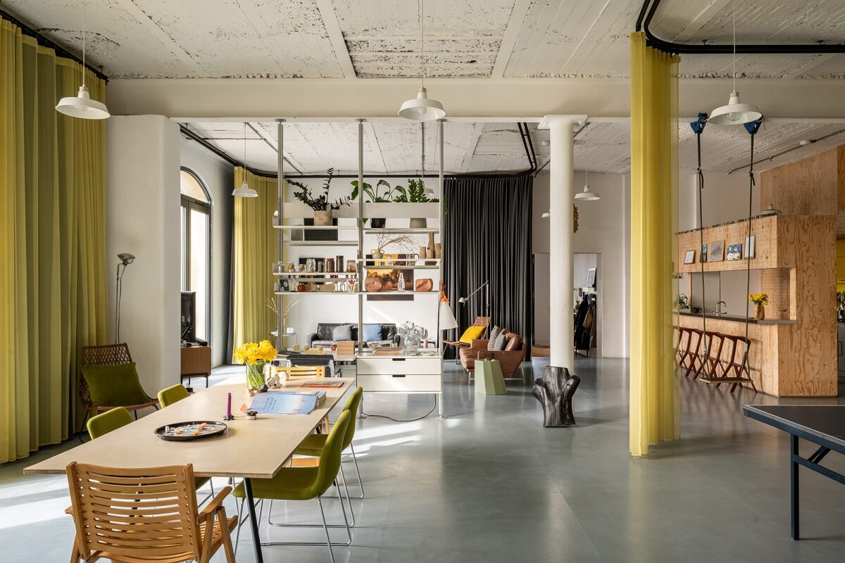yellow accents in industrial loft