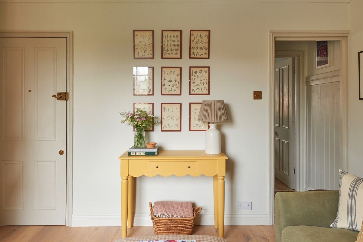 A Small Cottage-Style Apartment in London 5 yellow side table