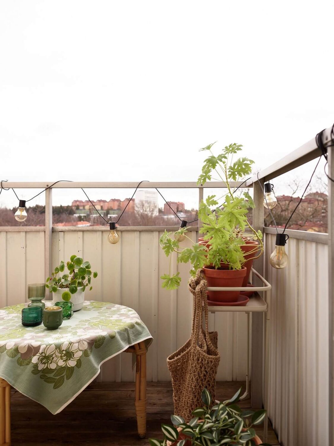 Revisiting a Small Green and Pink Midcentury Apartment 12 balcony Revisiting a Small Green and Pink Midcentury Apartment