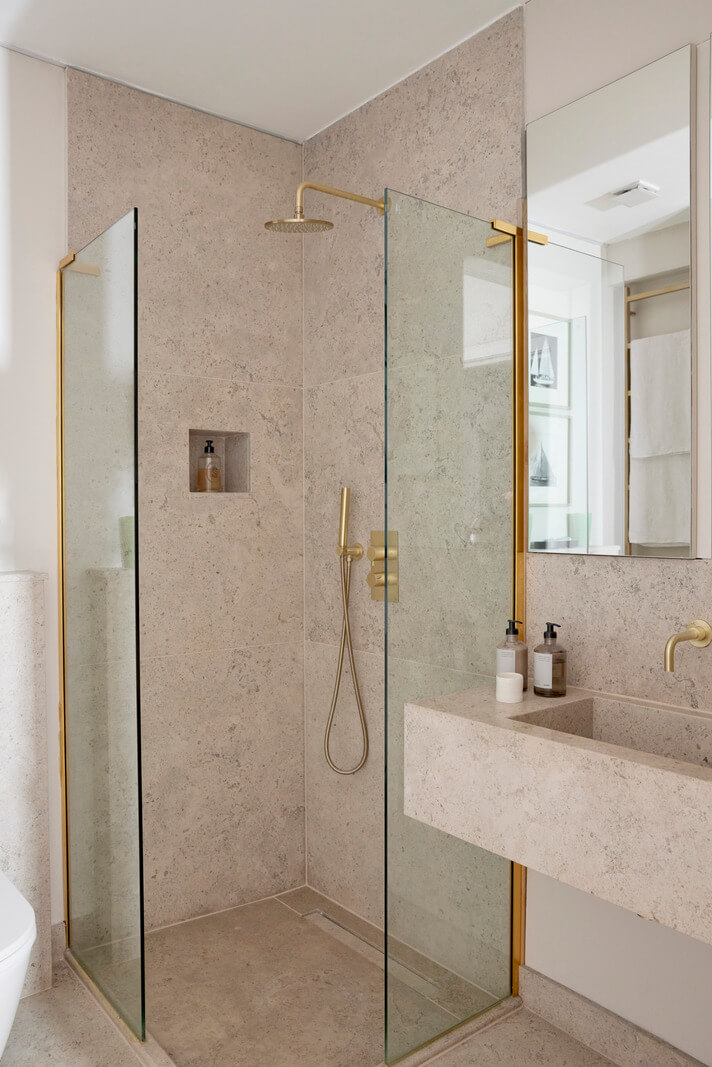 Modern Interiors in an Architectural 19th Century Building 14 bathroom with Moleanos Azul limestone