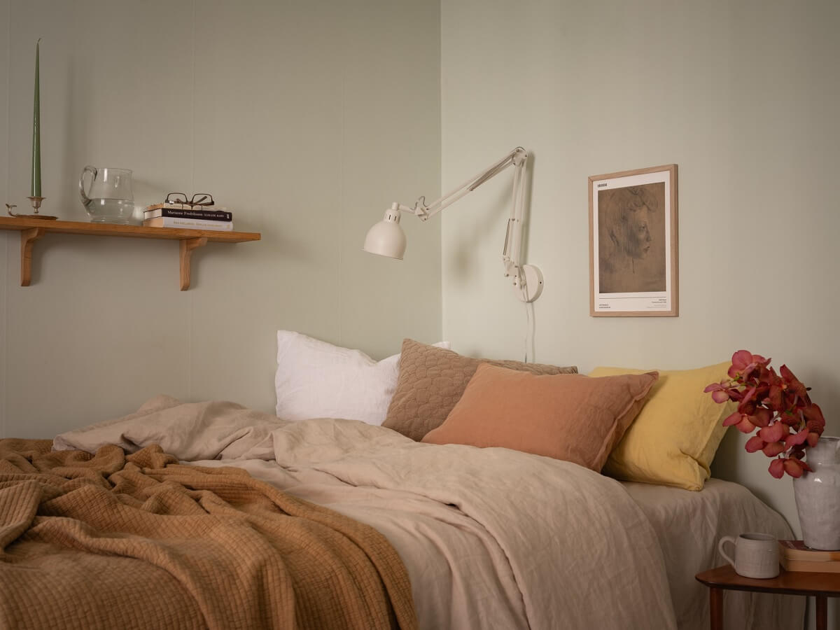 Calm Color Tones in a Light Scandinavian Studio Apartment 6 bed area with shelf in studio