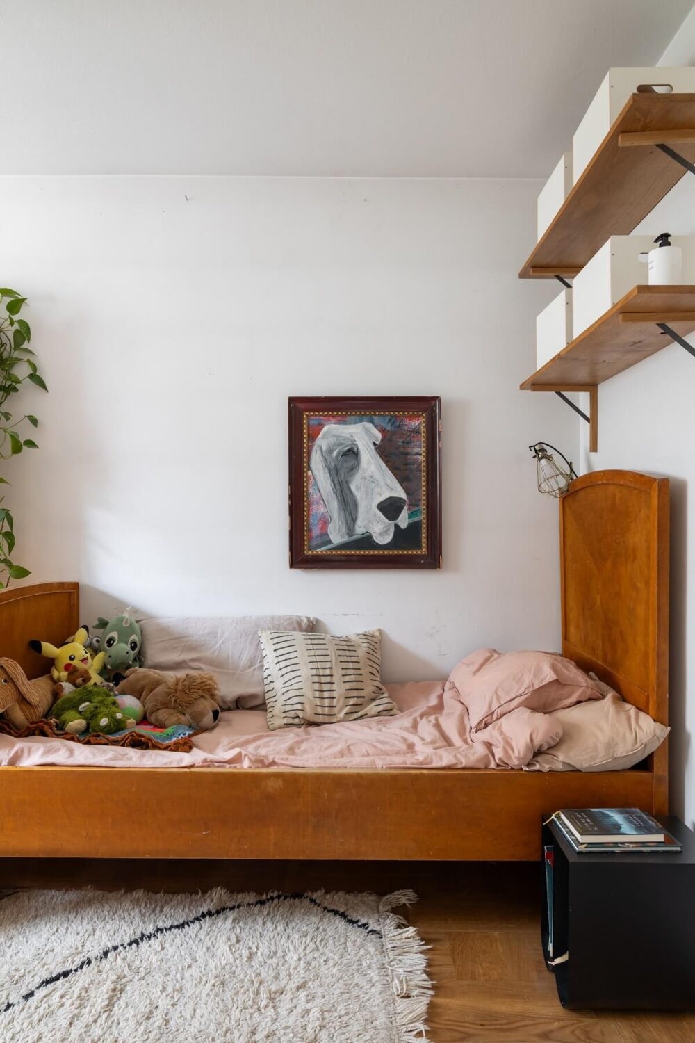 A Swedish Family House with Wall Murals and Art 12 bedroom with wooden bed