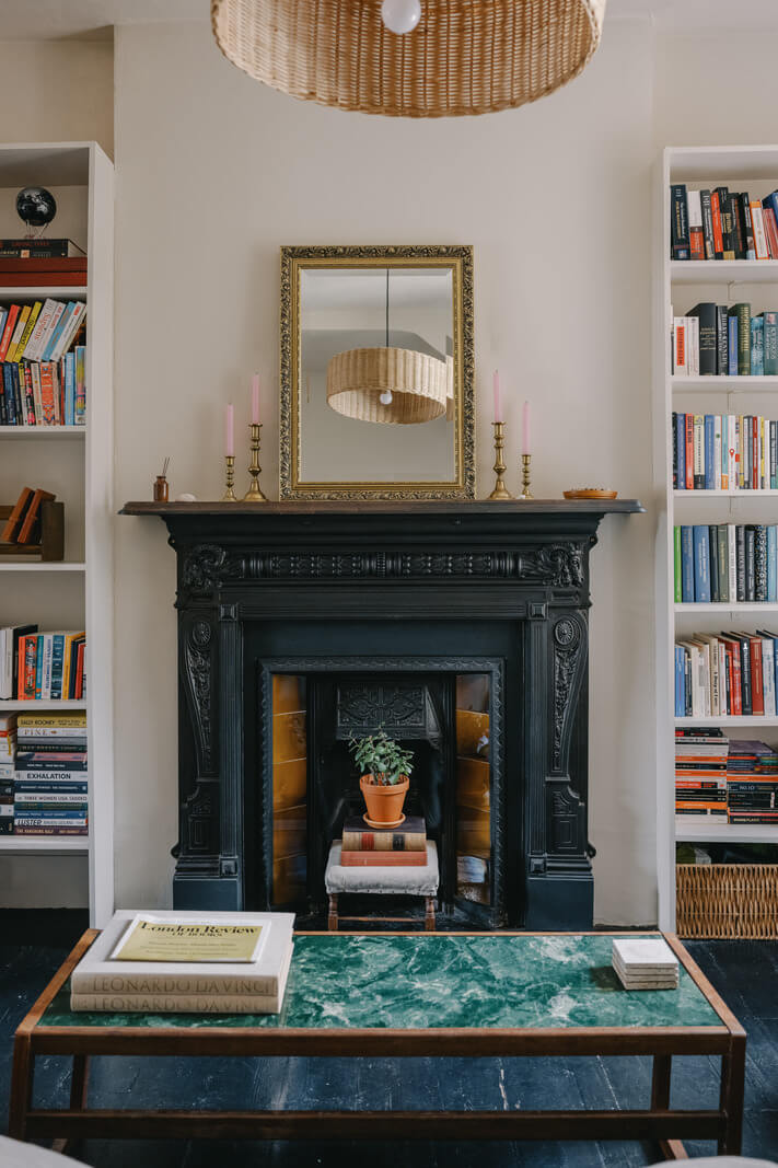 A Small London Apartment Filled with Books 3 black fireplace