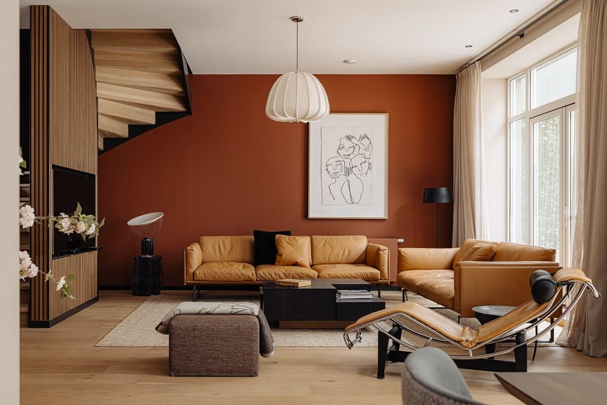A Modern Garage Conversion in The Netherlands 3 brown walls leather sofa living room
