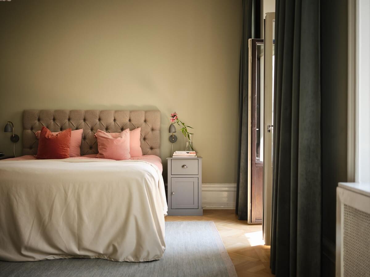 A Classic Stockholm Apartment with Floral Wallpaper 20 calm bedroom with gray green walls nordroom