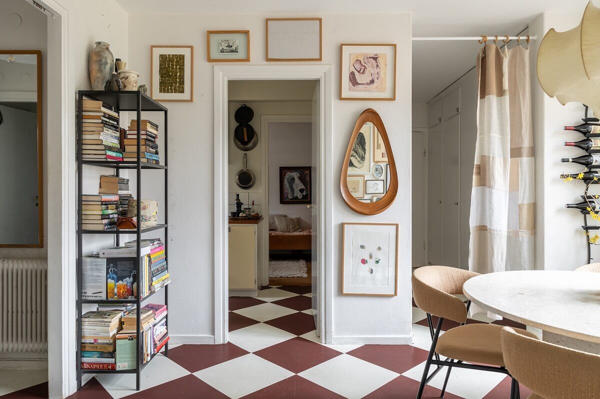 A Swedish Family House with Wall Murals and Art 10 checkerboard floor dining room