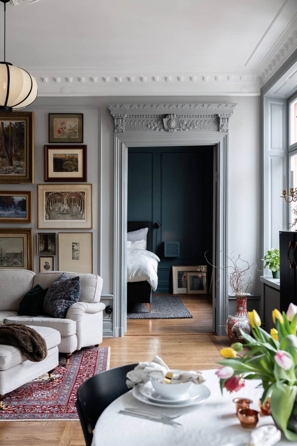 A Classic Swedish Apartment with a Dark Blue Bedroom 10 classic apartment with original details