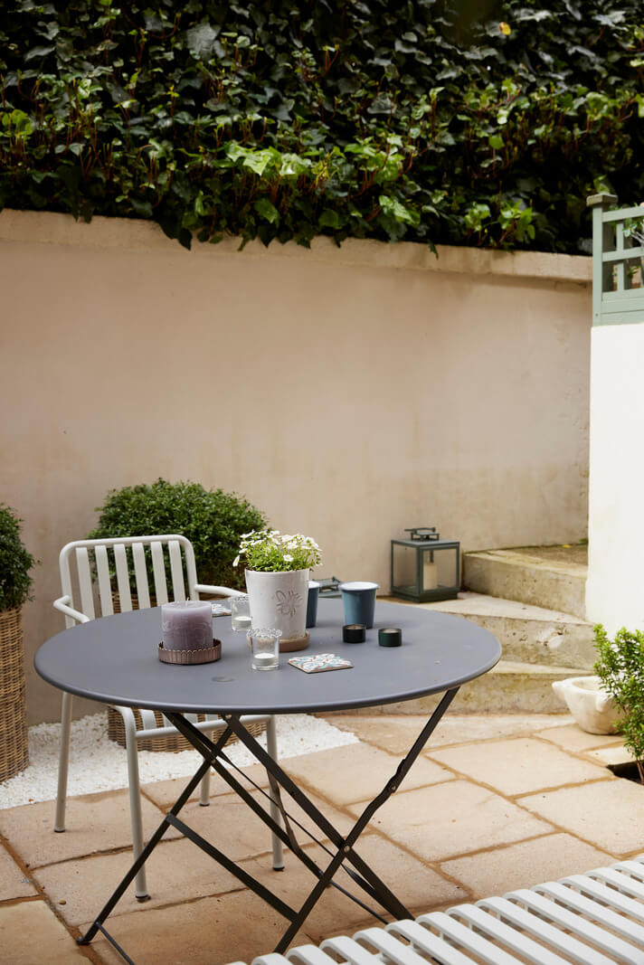 Modern Interiors in an Architectural 19th Century Building 17 courtyard garden with dining table