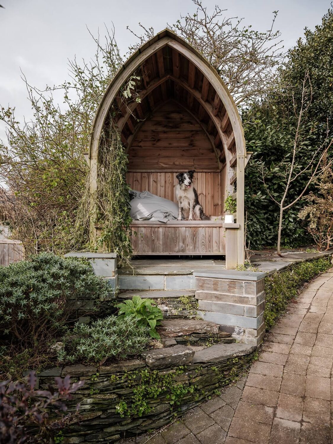 A Coastal White Painter's Home with Reclaimed Features in Cornwall 24 covered bench seating garden