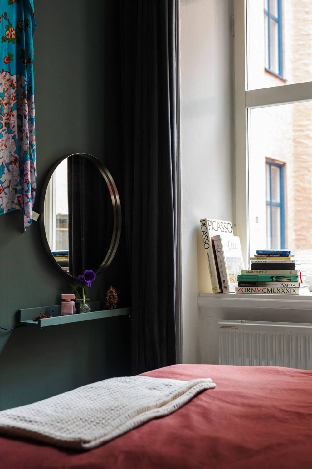 Period Details and Light Rooms in a Scandinavian Apartment 18 dark gray bedroom round mirror