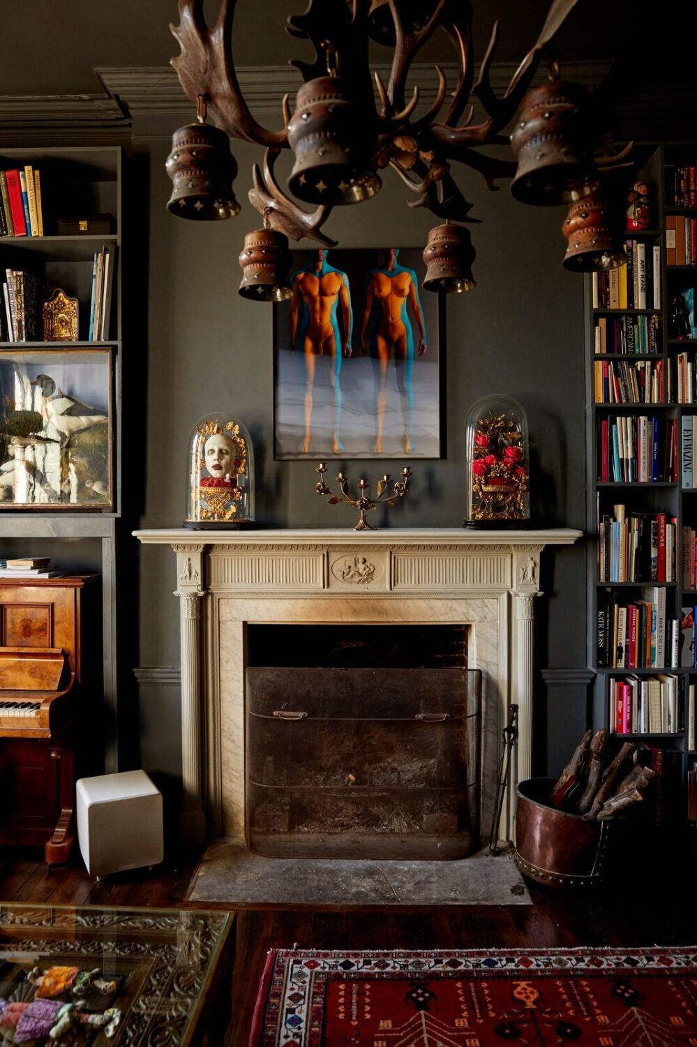A Georgian House in England with a Ballroom 2 dark gray living room with bookshelves and fireplace