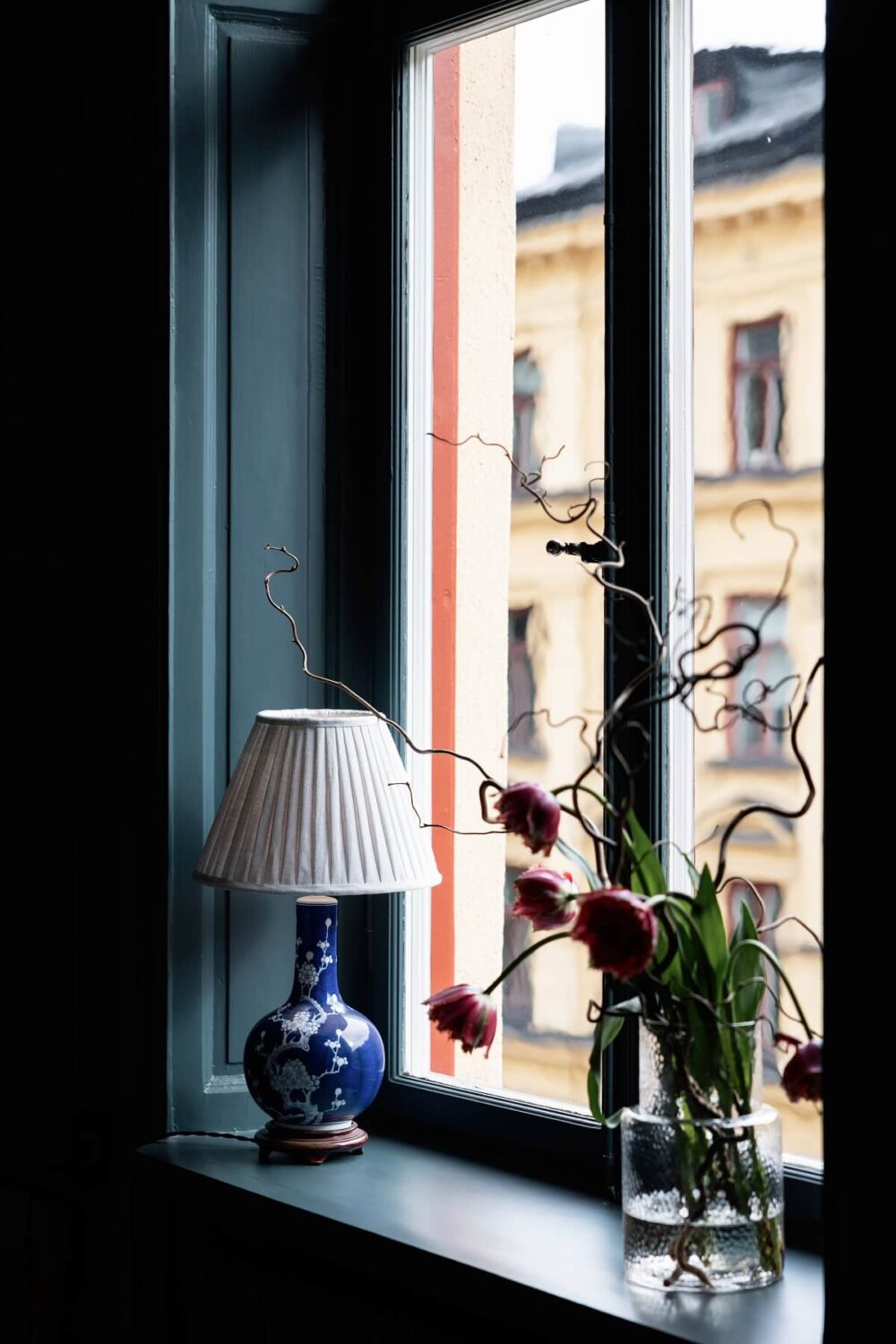 A Classic Swedish Apartment with a Dark Blue Bedroom 13 deep window sill