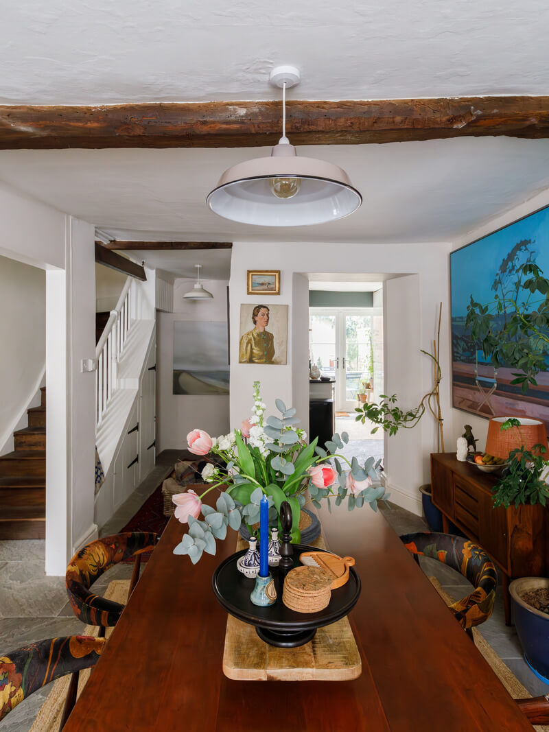 A Charming English Cottage Filled with Historic Character 7 dining room with wooden beam