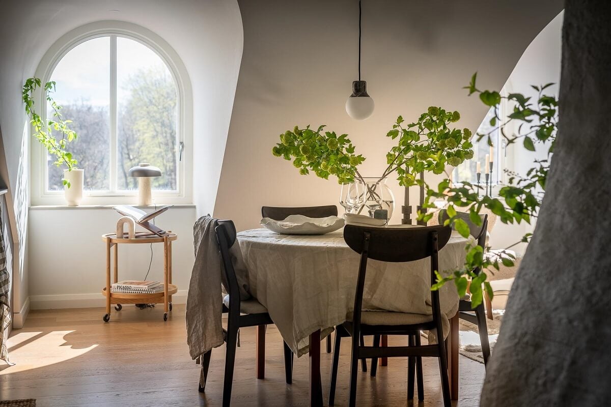 An Attic Studio Apartment with a Glass Room Divider 10 dining space