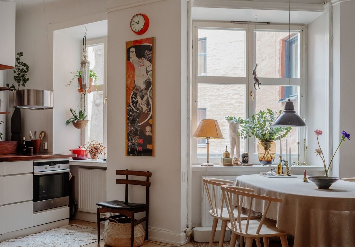 Period Details and Light Rooms in a Scandinavian Apartment 10 dining table open plan kitchen