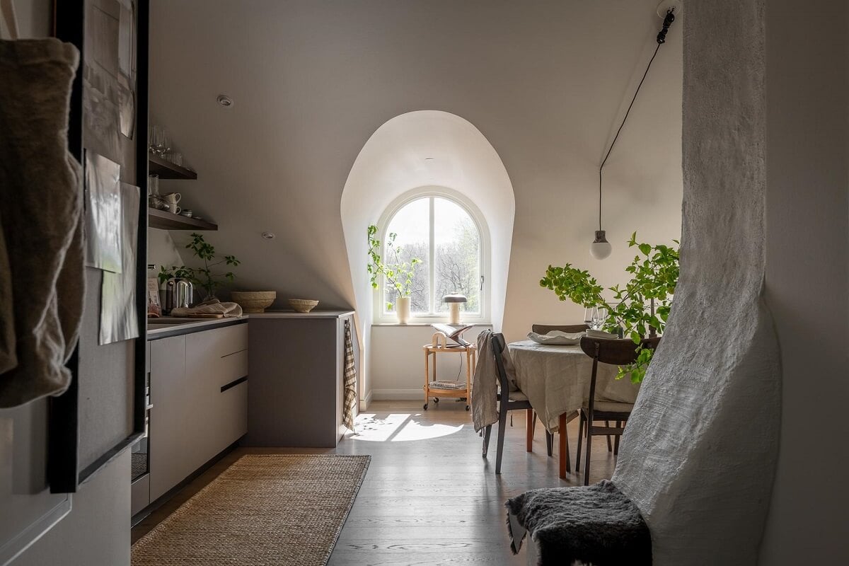An Attic Studio Apartment with a Glass Room Divider 11 dormer window