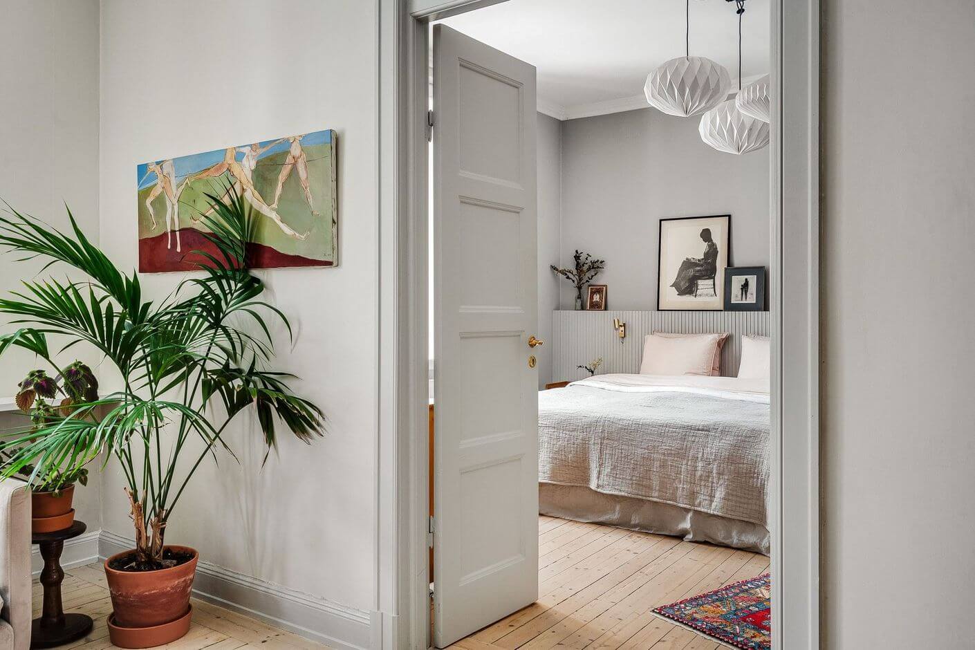 A Swedish Family Apartment with a Butter Yellow Kitchen 12 double doors leading to bedroom