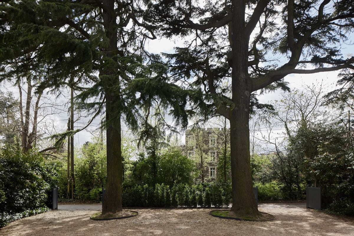 Historic Features and Modern Design in an English Regency Villa 28 driveway with trees