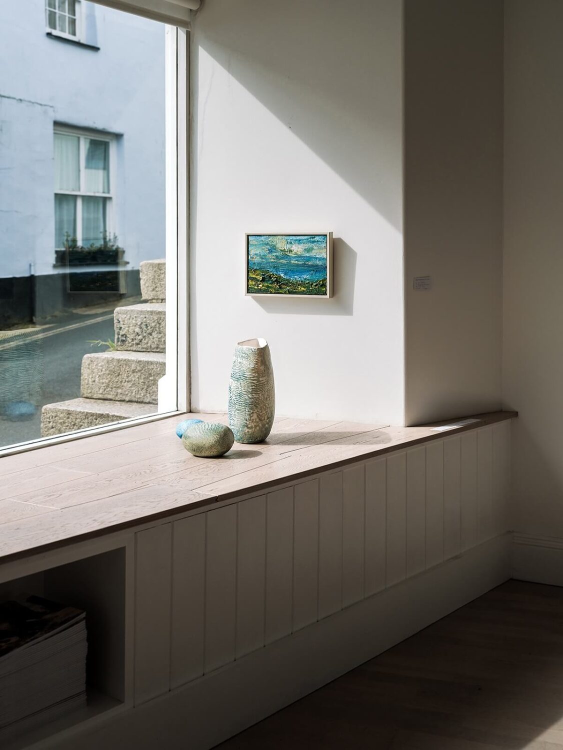 A Coastal White Painter's Home with Reclaimed Features in Cornwall 19 gallery window bench