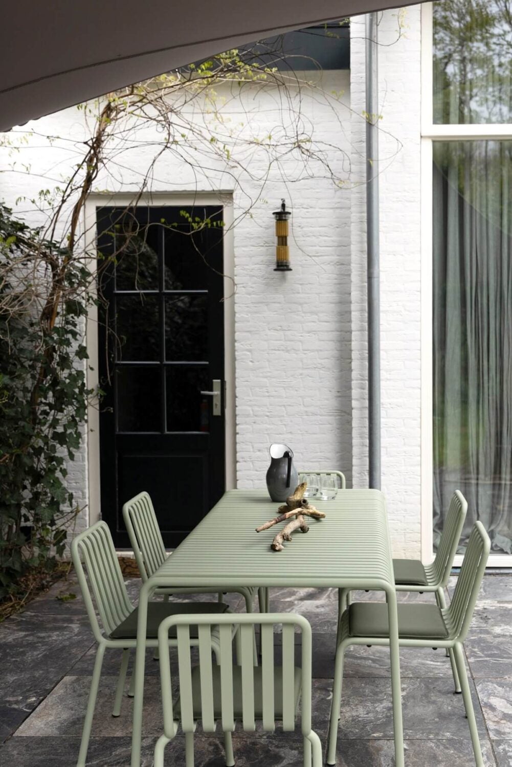 A Warm Atmosphere in a Historic Dutch Villa 30 garden with dinner table