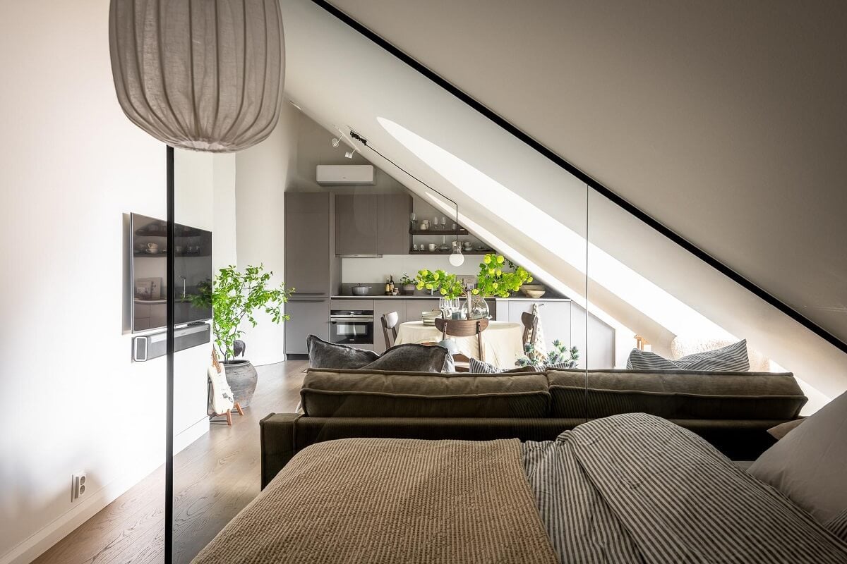 An Attic Studio Apartment with a Glass Room Divider 7 glass room divider studio apartment