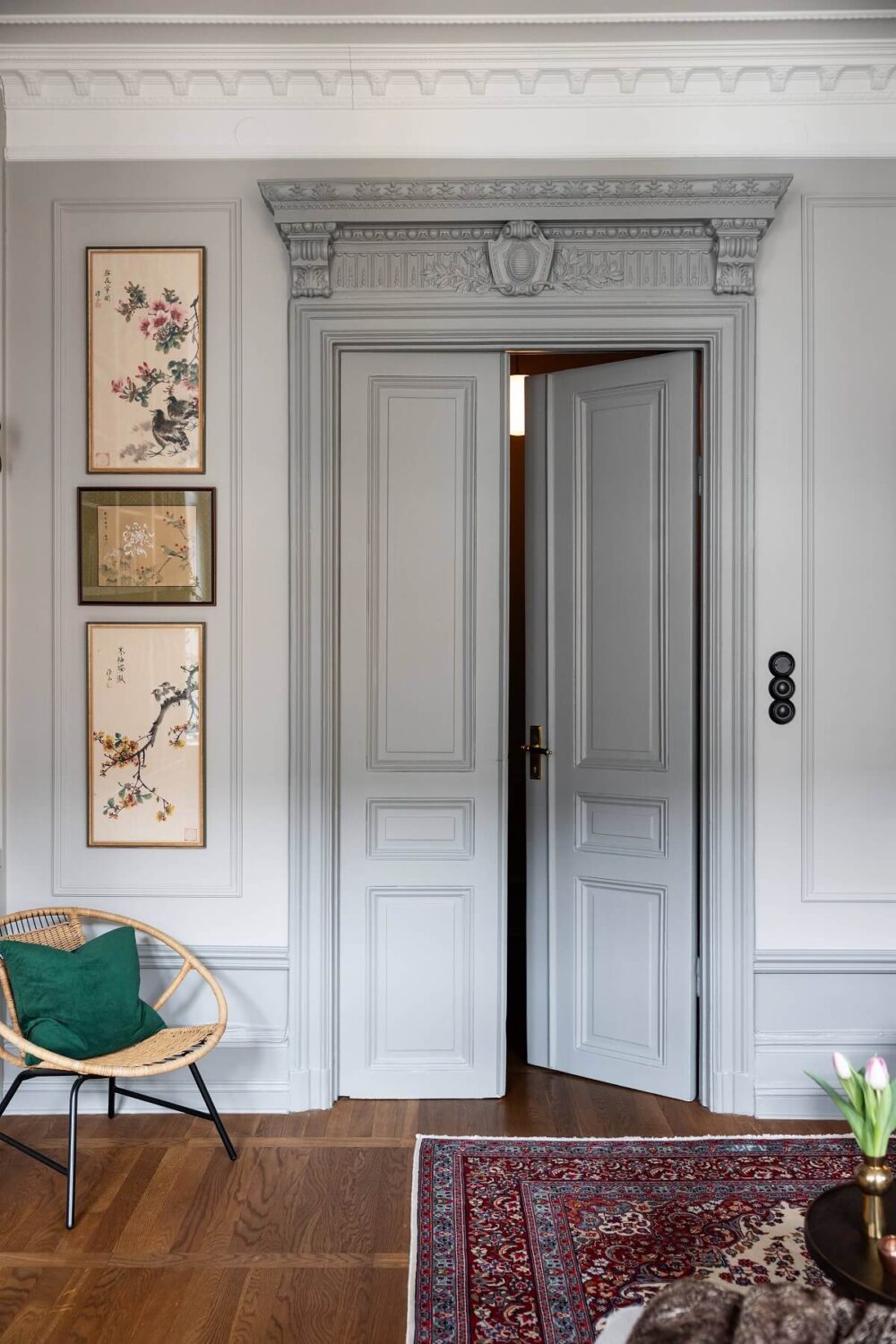 A Classic Swedish Apartment with a Dark Blue Bedroom 18 gray double doors with original details