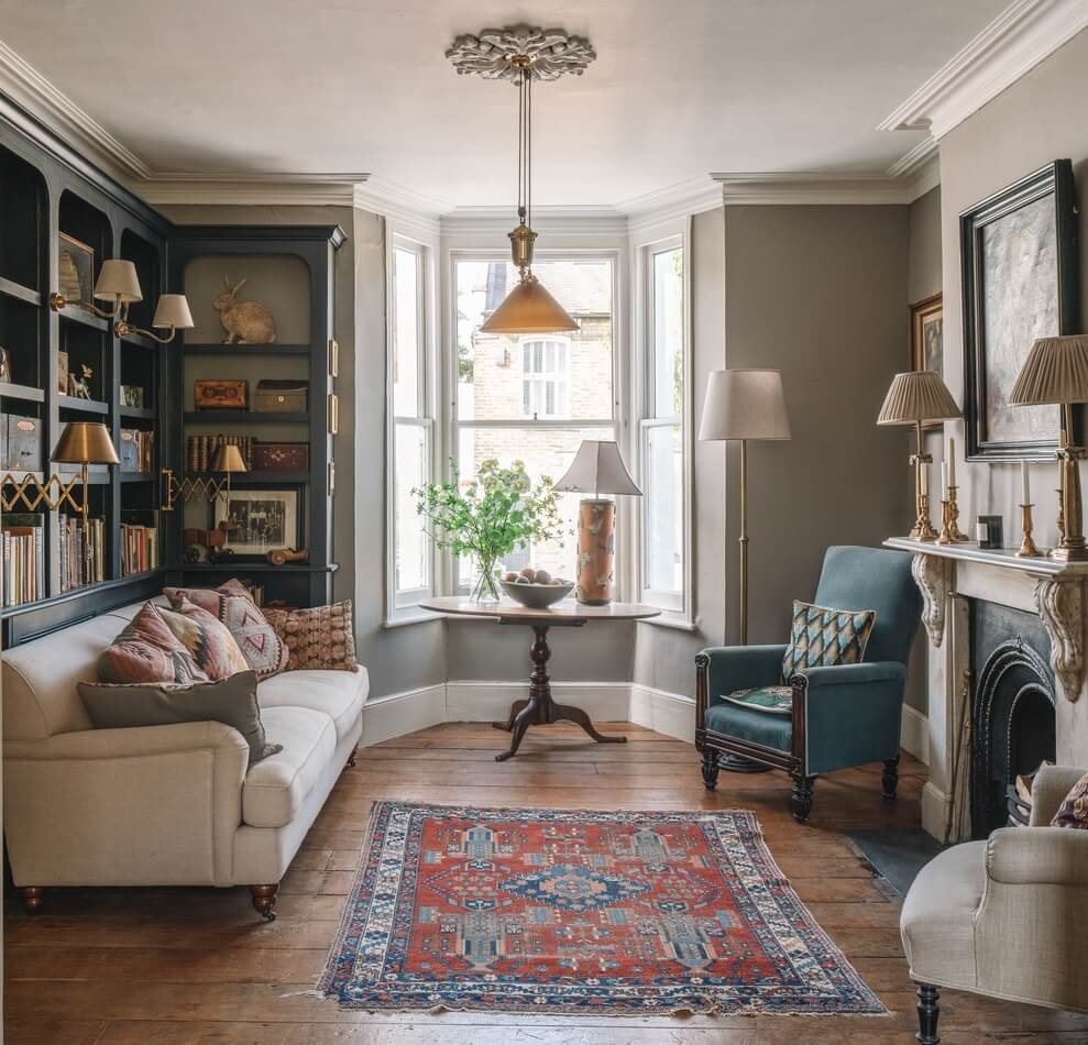 Best of 2024: Living Rooms 41 gray historic liivng room with bookcases and fireplace nordroom
