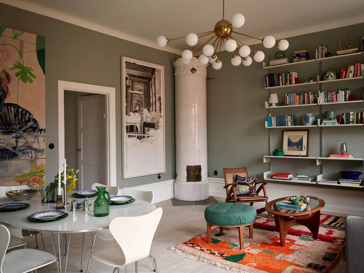 A Green Kitchen in a Gray Family Apartment 5 gray living room with bookshelves and kakelugn