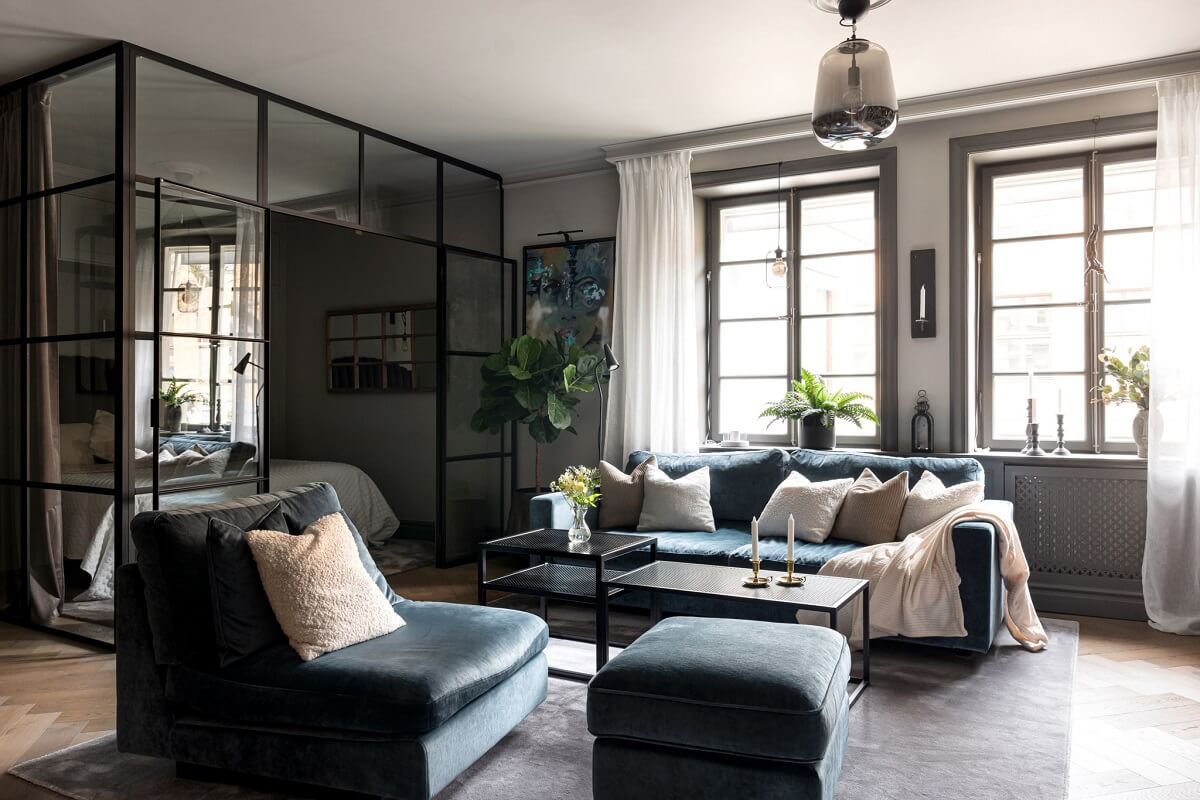 A Gray Apartment with an Industrial Glass Bedroom 10 gray living room with industrial glass wall