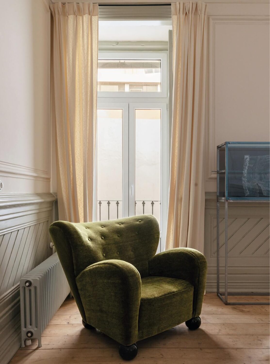 The Gallery Home: A Custom-Built Design Apartment in Portugal 12 green armchair