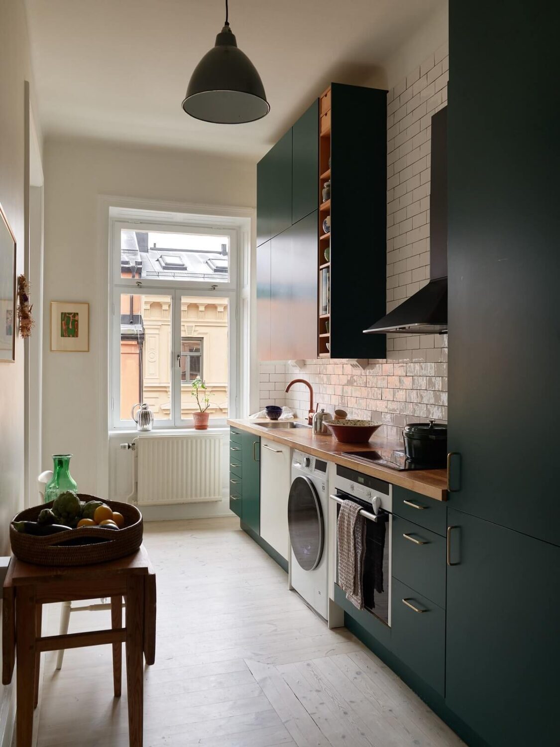 A Green Kitchen in a Gray Family Apartment 13 green kitchen cabints and white tiles