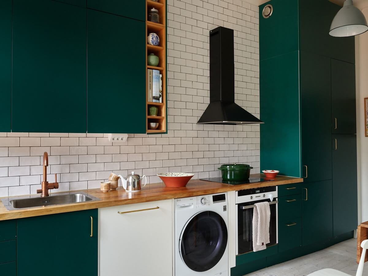 A Green Kitchen in a Gray Family Apartment 10 green kitchen with white tiles