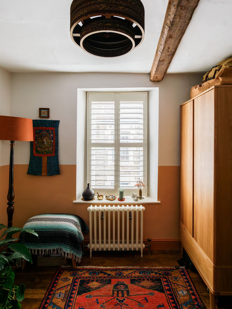 A Charming English Cottage Filled with Historic Character 14 half painted ochre wall