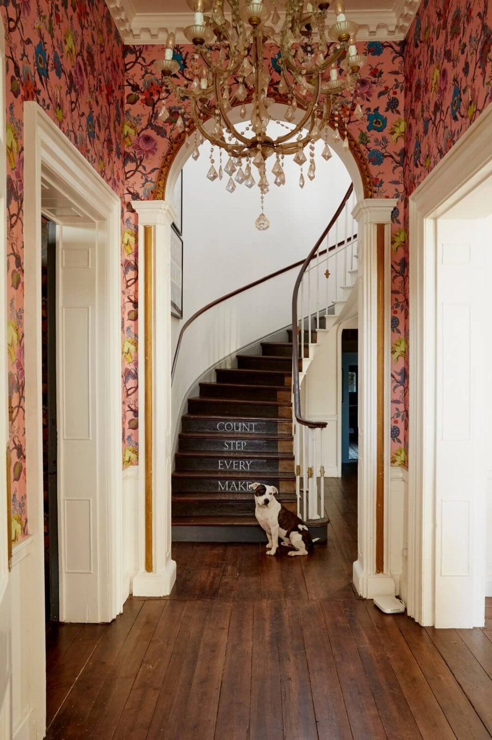 A Georgian House in England with a Ballroom 11 hallway with pink house of hackney wallpaper