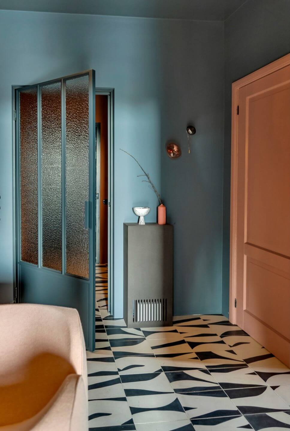 Color and Graphic Design in the Home of a Dutch Interior Stylist 38 industrial door and graphic tiles