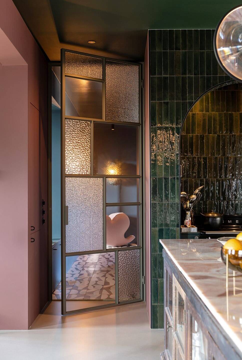 Color and Graphic Design in the Home of a Dutch Interior Stylist 13 industrial glass door